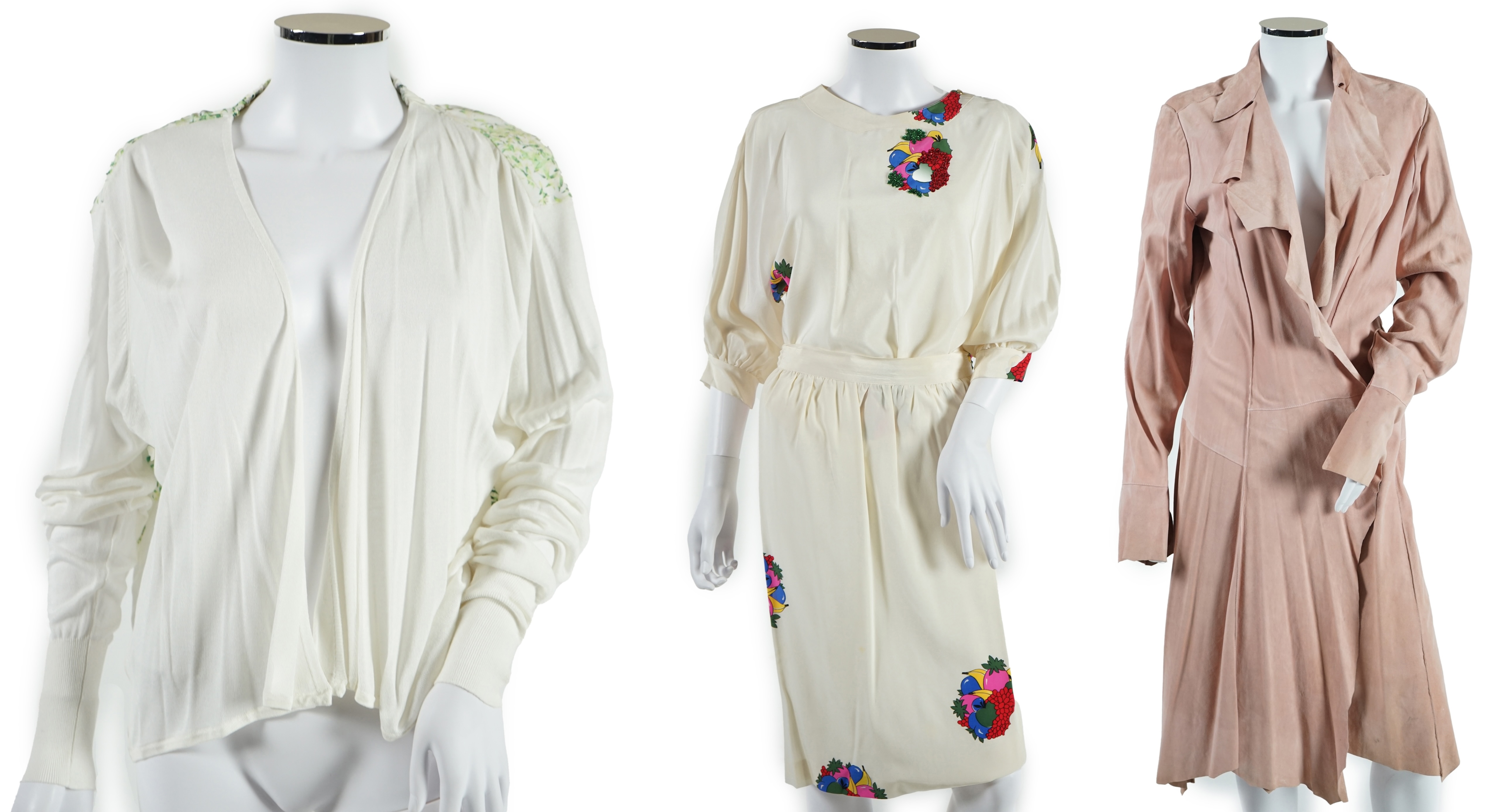 A lady's Angela Caputi silk cream skirt and blouse with fruit design size 46, a Ted Baker white lightweight cardigan with leaf design to the back size 4, a Rawhide dusky pink long laser cut coat size 14 and a Georgina vo